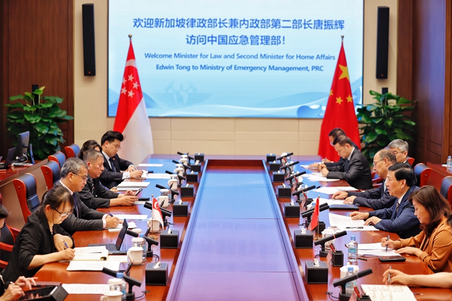 王祥喜會(huì)見新加坡律政部長(zhǎng)兼內(nèi)政部第二部長(zhǎng)唐振輝